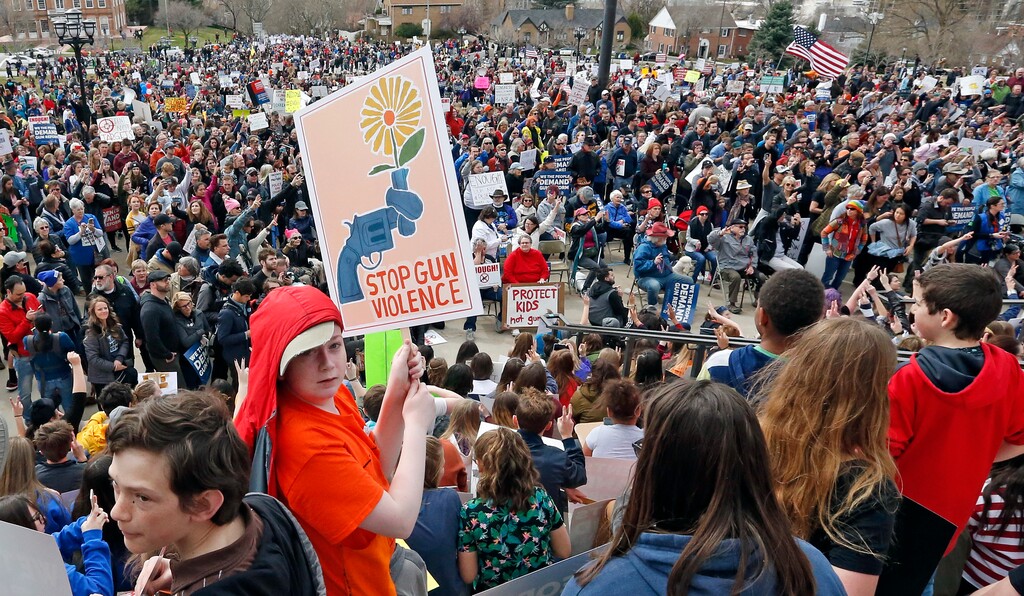 Protesters rally at the Utah Capitol on Saturday, March 24, 2018, in Salt Lake City, seeking stronger gun-control measures. (AP Photo/Rick Bowmer)