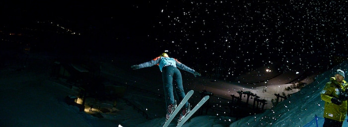 (Leah Hogsten  |  The Salt Lake Tribune) U.S. Freestyle Ski Team member Winter Vinecki performs her aerial routine under the watch of head coach Vladimir Lebedev during practice Jan. 7, 2020 at the Utah Olympic Park.