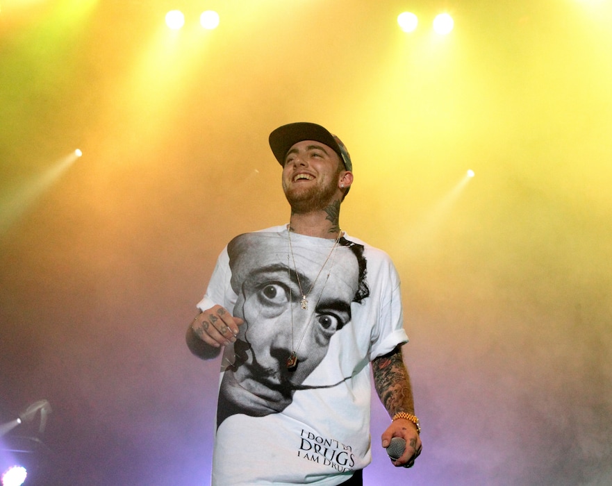 (Owen Sweeney | Invision | The Associated Press) In this July 13, 2013, file photo, Rapper Mac Miller performs on his Space Migration Tour at Festival Pier in Philadelphia. A Los Angeles County coroner's report released Monday, Nov. 5, 2018, named the 26-year-old Miller's cause of death as "mixed toxicity," saying cocaine, alcohol and the powerful opioid fentanyl were found in his system. Paramedics found Miller unresponsive in his Los Angeles home on Sept. 7 and declared him dead soon after.