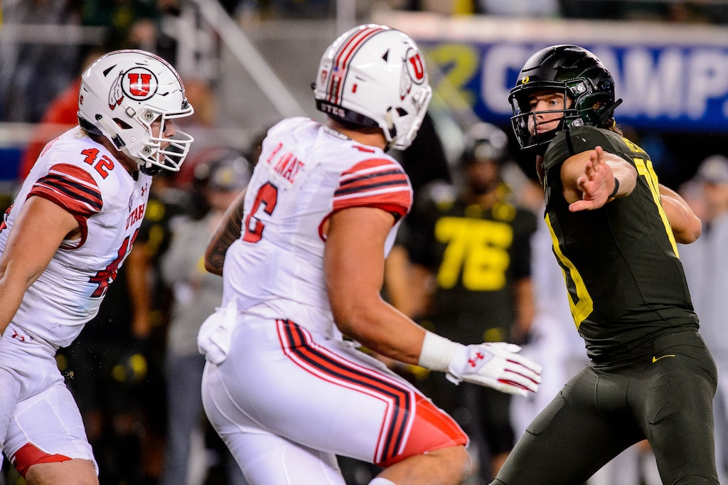 (Trent Nelson | The Salt Lake Tribune) Utah defensive end Bradlee Anae (6) pursues Oregon quarterback Justin Herbert in the Pac-12 championship game Friday in Santa Clara, Calif.