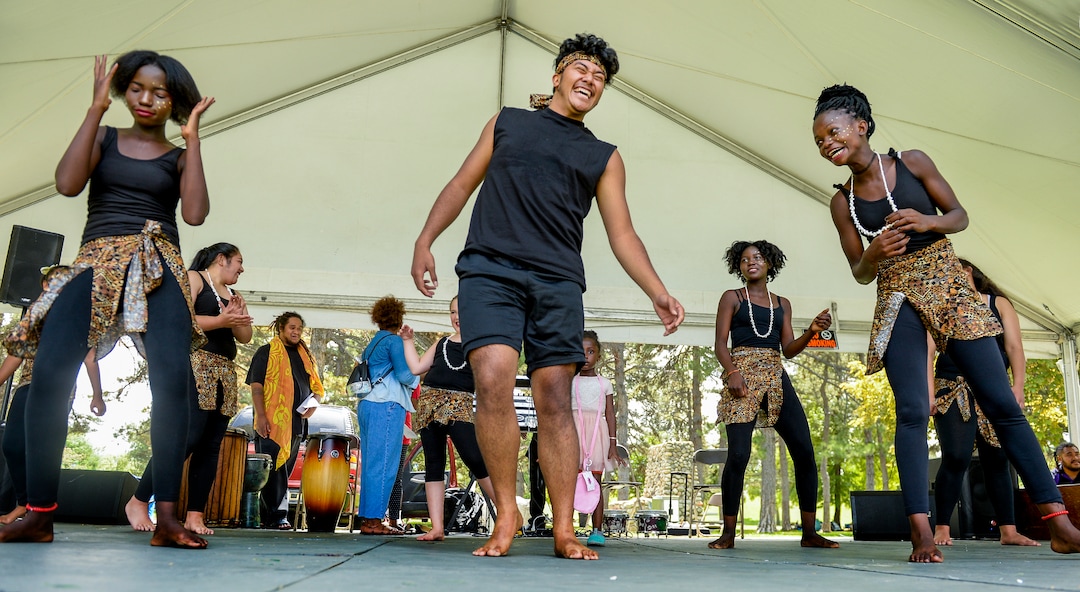 (Leah Hogsten  |  The Salt Lake Tribune) Left to right: Benedith Naskiain, Po Hafoka and Judith Gangnon, dancers with Siphya Dance Group, share a laugh during the 4th Annual African Festival sponsored by the United Africans of Utah, Saturday, July 27, 2019 at Liberty Park. The African Festival promotes African tradition, culture and heritage through the arts, food fashion, music and dance.