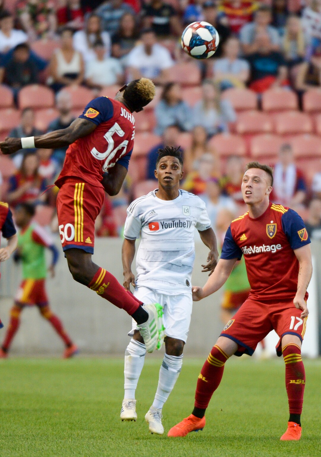 (Leah Hogsten  |  The Salt Lake Tribune) Real Salt Lake forward Sam Johnson (50) tries to knock a header to teammate Real Salt Lake forward Corey Baird (17) as Real Salt Lake hosts Los Angeles Football Club in the fourth round of the Lamar Hunt U.S. Open Cup, June 11, 2019 at Rio Tinto Stadium in Sandy.