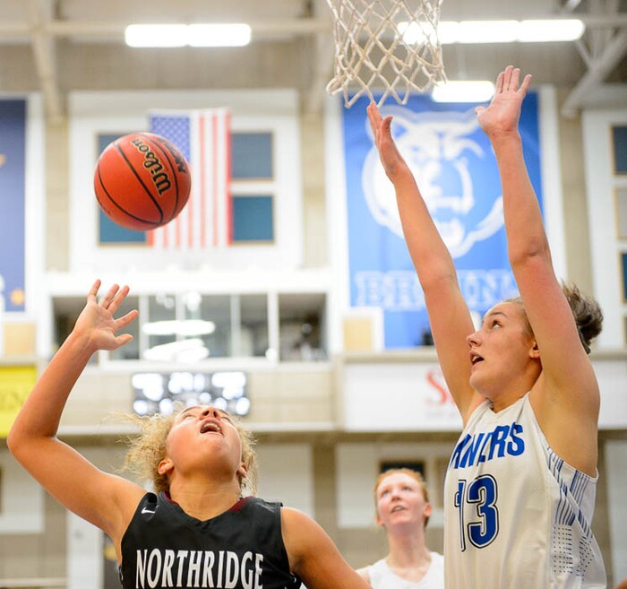 (Trent Nelson | The Salt Lake Tribune)  Northridge's Brooklyn Perkins (3) drives with Bingham's Kasia Higgins (13) defending as Bingham faces Northridge in the 6A High School Girls' Basketball Tournament at SLCC in Taylorsville, Thursday Feb. 22, 2018.