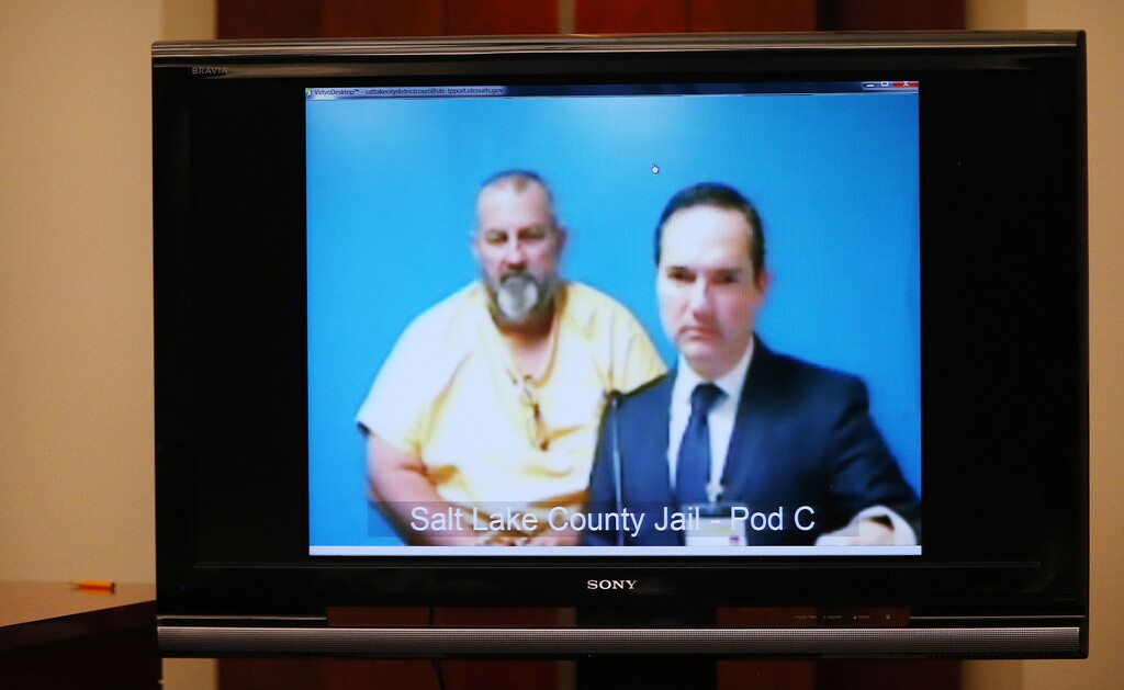 (Jeffrey D. Allred | Deseret News, pool photo) Kevin Wayne Billings, accused killing West Valley City code officer Jill Robinson, makes his first video court appearance with defense attorney Nick Falcone in Salt Lake City on Friday, Aug. 24, 2018.