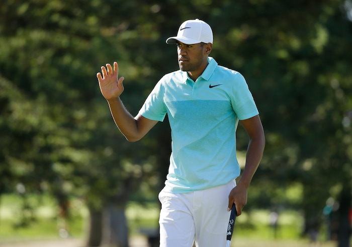 Tony Finau reacts after making a birdie putt on the 13th green of the Silverado Resort North Course during the final round of the Safeway Open PGA golf tournament Sunday, Oct. 8, 2017, in Napa, Calif. (AP Photo/Eric Risberg)