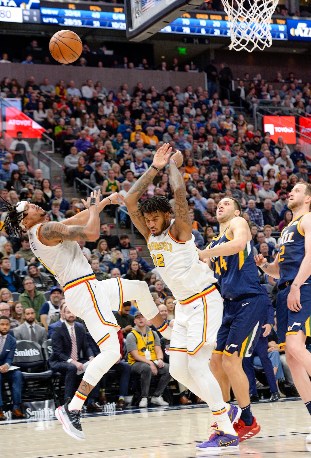 (Leah Hogsten  |  The Salt Lake Tribune) Golden State Warriors guard Damion Lee (1) reacts after colliding with teammate Golden State Warriors forward Marquese Chriss (32) as the Utah Jazz defeated the Golden State Warriors, 114-106, Dec. 13, 2019 at Vivint Arena.