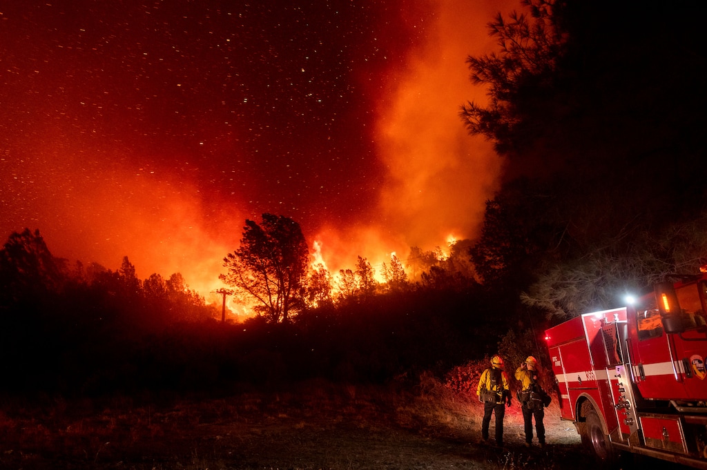 (Noah Berger | AP photo)

Firefighters watch the Bear Fire approach in Oroville, Calif., Sept. 9, 2020.