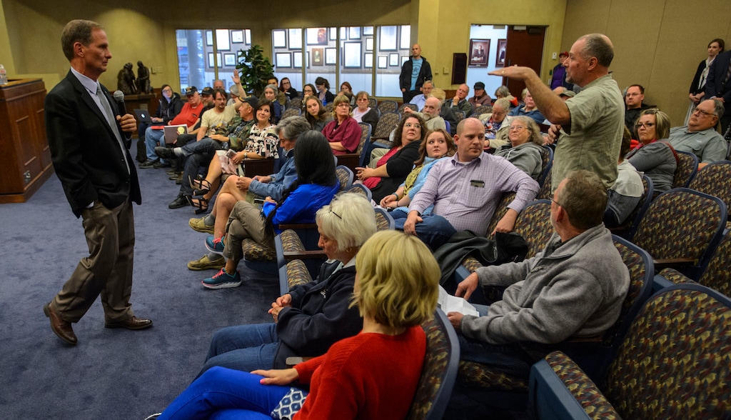 (Steve Griffin  |  The Salt Lake Tribune) Rep. Chris Stewart, R-Utah, takes questions from the audience during his town hall meeting at the West Valley City Hall in West Valley City Wednesday May 2, 2018.