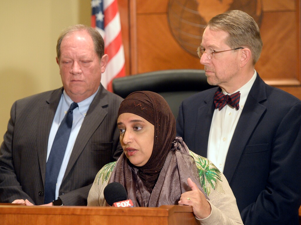 (Al Hartmann  |  The Salt Lake Tribune)
Attorneys Brad Parker, left back, and James McConkie join Noor Ull-Hasan, a Muslim community leader, to announce that a diverse, nonpartisan group of attorneys and other professionals from around the state have formed the Refugee Justice League of Utah. The new organization is dedicated to promoting and defending the civil, religious, and constitutional rights of persons who are discriminated against on the basis of their religious beliefs and national origins.  They will oppose and restrictions on the rights of refugees such as mandatory registration and any other laws that curtail the rights and privileges of people who live here.