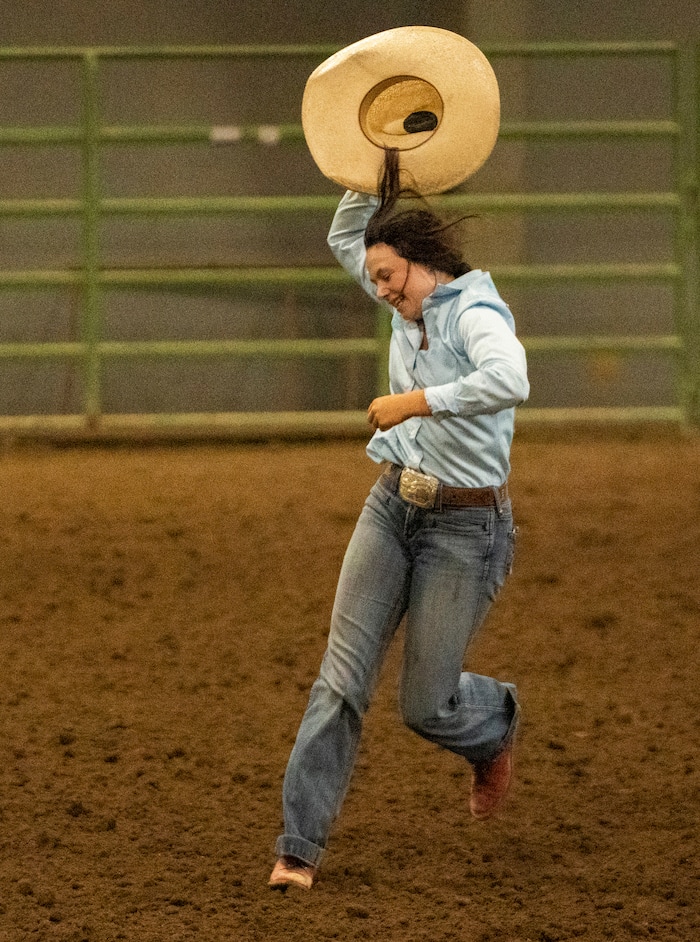 (Rick Egan | The Salt Lake Tribune) Alexis Hutchings celebrates her wining score in the goat tying competition at the Panguitch Invitation Rodeo on Saturday, July 23, 2022.