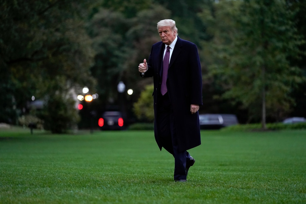 President Donald Trump walks from Marine One to the White House in Washington, Thursday, Oct. 1, 2020, as he returns from Bedminster, N.J. (AP Photo/Carolyn Kaster)