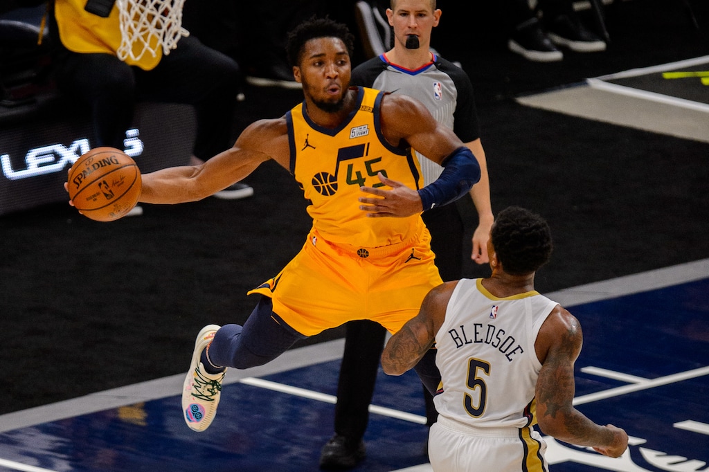 (Trent Nelson  |  The Salt Lake Tribune) Utah Jazz guard Donovan Mitchell (45) makes a flying pass as the Utah Jazz host the New Orleans Pelicans, NBA basketball in Salt Lake City on Tuesday, Jan. 19, 2021.