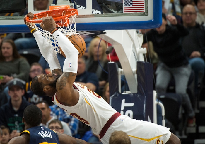 (Rick Egan  |  The Salt Lake Tribune)   Cleveland Cavaliers forward LeBron James (23) dunks the ball, in NBA action Utah Jazz vs Cleveland Cavaliers, in Salt Lake City,  Saturday, December 30, 2017.


