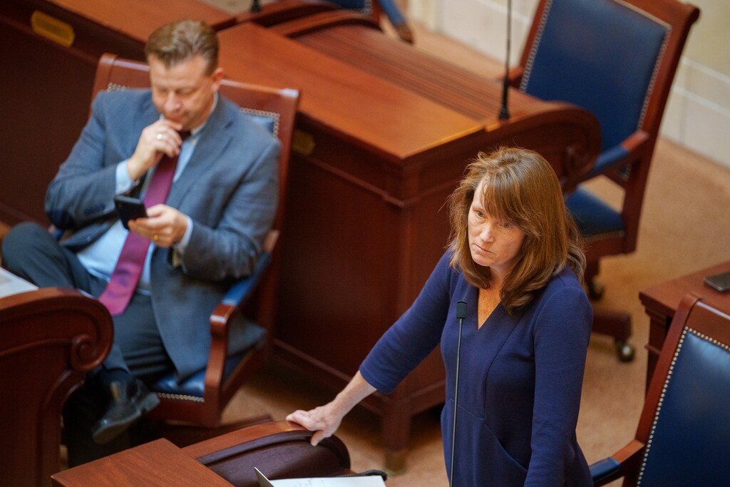 (Trent Nelson  |  The Salt Lake Tribune) Sen. Kathleen Riebe, D-Cottonwood Heights, speaks on the floor of the Utah Senate, March 25, 2022. At left is Sen. Todd Weiler, R-Woods Cross.