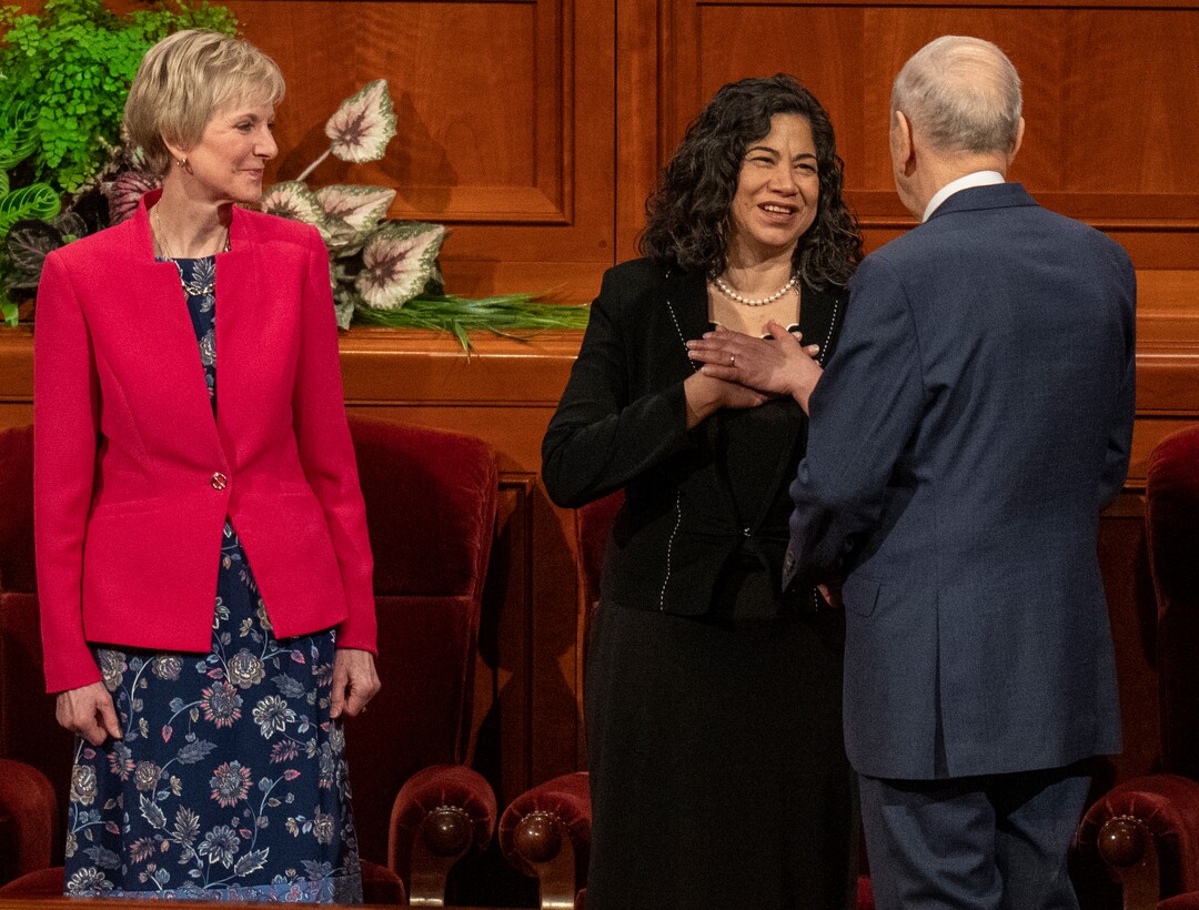 (Rick Egan | The Salt Lake Tribune)   Relief Society General President Jean Bingham looks on as President Russel M. Nelson visits with Reyna Aburto before the Women's session of LDS General Conference on Saturday, April 2, 2022.
