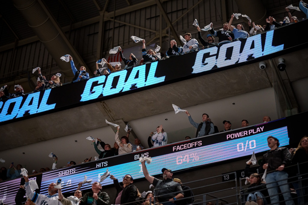 (Trent Nelson  |  The Salt Lake Tribune) Fans celebrate a goal as Utah Hockey Club hosts the Anaheim Ducks, NHL hockey in Salt Lake City on Wednesday, March 12, 2025.