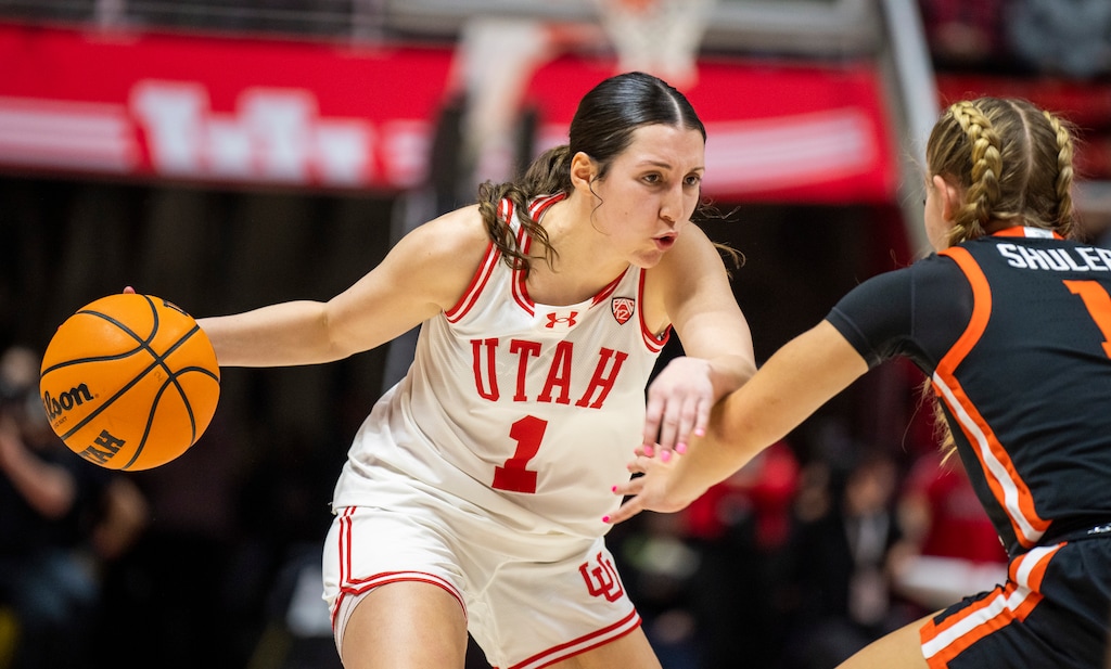 (Rick Egan | The Salt Lake Tribune)  Utah Utes guard Isabel Palmer (1) takes the ball up the middle, as Oregon State Beavers guard Kennedie Shuler (1) defends, in PAC-12 basketball action between the Utah Utes and the Oregon State Beavers, at the Jon M. Huntsman Center, on Friday, Feb. 9, 2024.