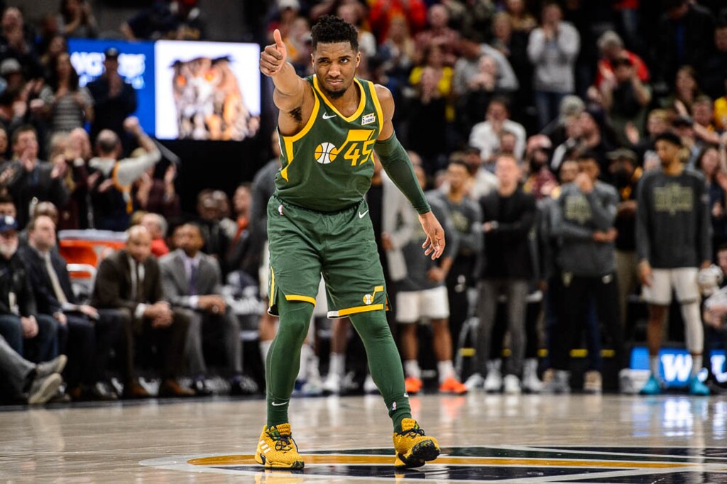 (Trent Nelson | The Salt Lake Tribune)
Utah Jazz guard Donovan Mitchell (45) celebrates as Utah Jazz forward Derrick Favors (15) makes a free throw in the final minute as the Utah Jazz host the Milwaukee Bucks, NBA basketball in Salt Lake City on Saturday March 2, 2019.