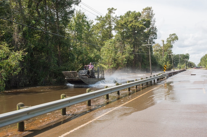 (Rachel Molenda  |  The Salt Lake Tribune) Dennis Landry maneuvers his airboat throughout Rose City, Texas, on Tuesday, Sept. 5, 2017. The town is inaccessible, as water still covers the roadways and much of their homes.
