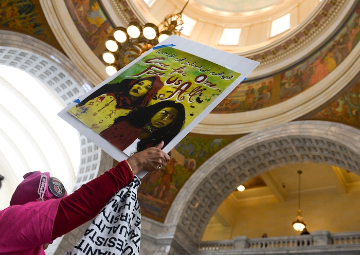 (Leah Hogsten | The Salt Lake Tribune) Muslim leader, community activist, nonprofit organization founder Noor Ul-Hasan holds a sign to bring attention to Muslim women's rights at Amplifying WomenÕs Voices rally to celebrate International WomenÕs Day at the Utah State Capitol Rotunda, hosted by KRCL ,Thursday, March 8, 2018.