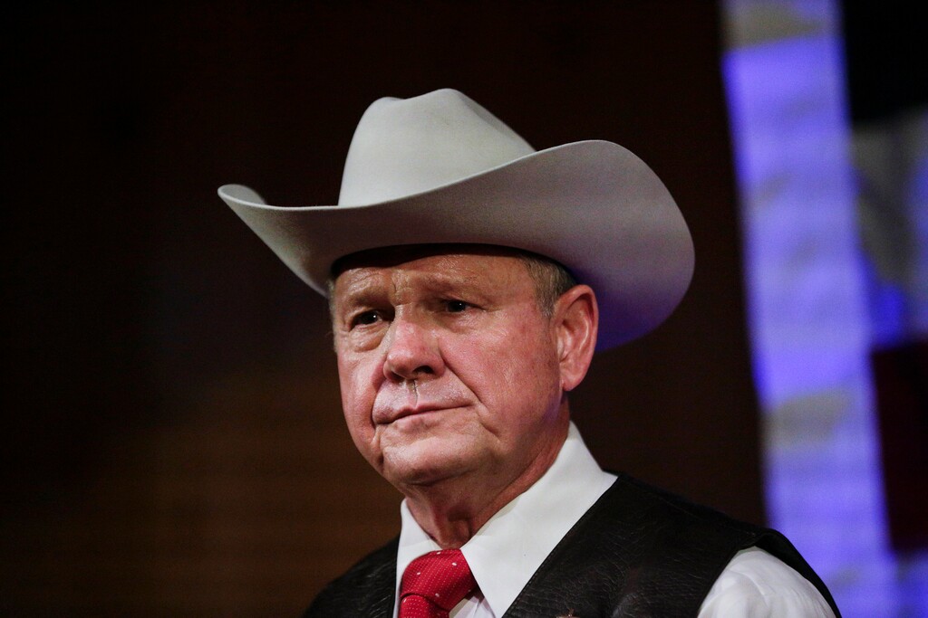 FILE - In this Monday, Sept. 25, 2017, file photo, former Alabama Chief Justice and U.S. Senate candidate Roy Moore speaks at a rally, in Fairhope, Ala. According to a Washington Post story Nov. 9, an Alabama woman said Moore made inappropriate advances and had sexual contact with her when she was 14. (AP Photo/Brynn Anderson, File)