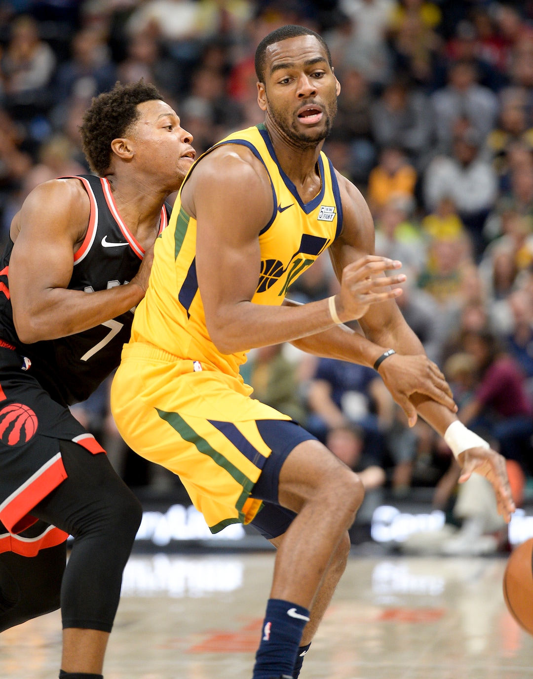 Leah Hogsten  |  The Salt Lake Tribune  Toronto Raptors guard Kyle Lowry (7) tries to steal from Utah Jazz guard Alec Burks (10)as the Utah Jazz host the Toronto Raptors, Monday, Nov. 5, 2018 at  Vivint Smart Home Arena.