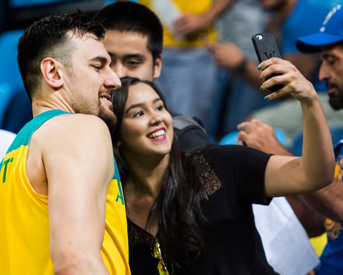 Rick Egan  |  The Salt Lake Tribune
Brazilian basketball fan Semelly Quirino, gets a selfie with Andrew Bogut (6) of Australia, after the France vs. Australia basketball game, in Rio de Janeiro, Friday, August 5, 2016.