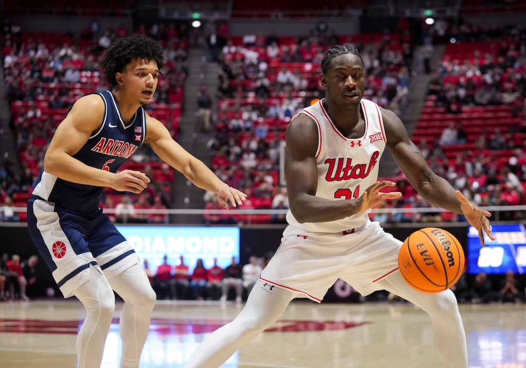 (Bethany Baker | The Salt Lake Tribune) Utah Utes forward Ibrahima Traore (31) looks to grab a pass as Arizona Wildcats guard Brayden Burries (5) defends during the game between the Utah Utes and the Arizona Wildcats in Salt Lake City on Saturday, Jan. 3, 2026.