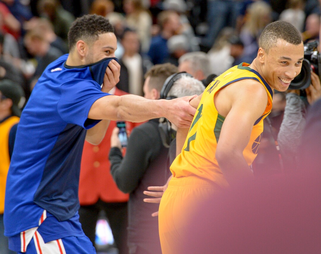 Leah Hogsten  |  The Salt Lake Tribune Philadelphia 76ers guard Ben Simmons (25) shares a laugh with Utah Jazz guard Dante Exum (11) and fellow Australian after the game. The Philadelphia 76ers defeated the Utah Jazz 114- 97 at Vivint Smart Home Arena, Thursday, December 27, 2018. 