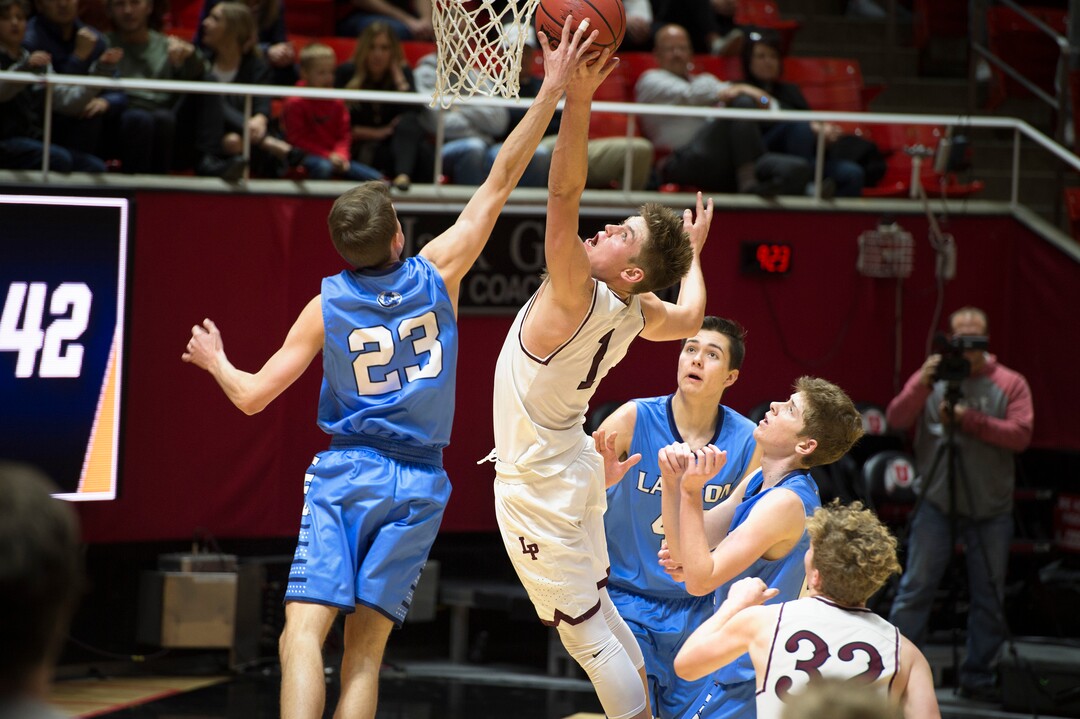 Scott Sommerdorf | The Salt Lake TribuneLone Peak's Max Brenchley reaches for a rebound during second half play. Lone Peak beat Layton 82-47, in a boy's 6A semi-final, FrIday, March. 2, 2018.