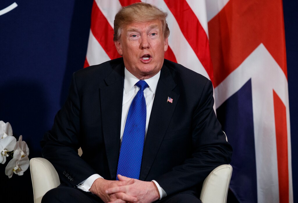 In this Jan. 25, 2018, photo, President Donald Trump speaks at the World Economic Forum in Davos. Trump’s loyalists are lashing out against his proposal to give path to citizenship for nearly 2 million “Dreamer” immigrants. (AP Photo/Evan Vucci)