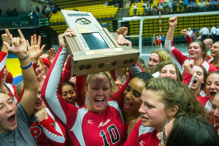 (Chris Detrick  |  The Salt Lake Tribune)  Park City's Bella Buchanan (10) celebrates with her teammates and fellow Miners after winning the 4A volleyball state championships at the UCCU Center at Utah Valley University Thursday, October 26, 2017.  Park City defeated Sky View 3-0.