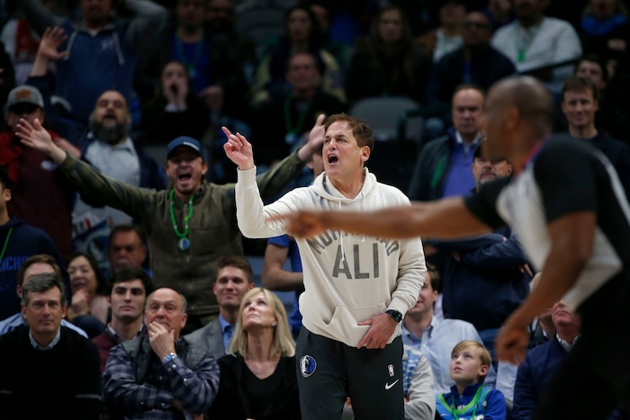 Dallas Mavericks owner Mark Cuban argues a call as they played the Utah Jazz during the second half an NBA basketball game in Dallas, Monday, Feb. 10, 2020. Utah defeated Dallas 123-119. (AP Photo/Michael Ainsworth)