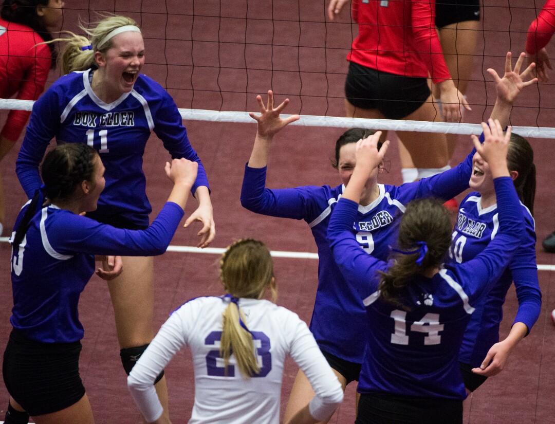 (Rick Egan  |  The Salt Lake Tribune)  The Box Elder Bees celebrate a big point over the Bountiful Braves, in 5A volleyball championship game, Bountiful vs. Box Elder, at Utah Valley University, Saturday, November 4, 2017.