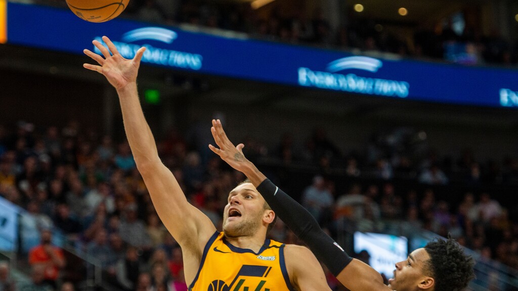 (Rick Egan  |  The Salt Lake Tribune)    Utah Jazz forward Bojan Bogdanovic (44) gets past San Antonio Spurs guard Dejounte Murray (5), in NBA action between the Utah Jazz and the San Antonio Spurs, in Salt Lake City, Friday, Feb. 21, 2020.