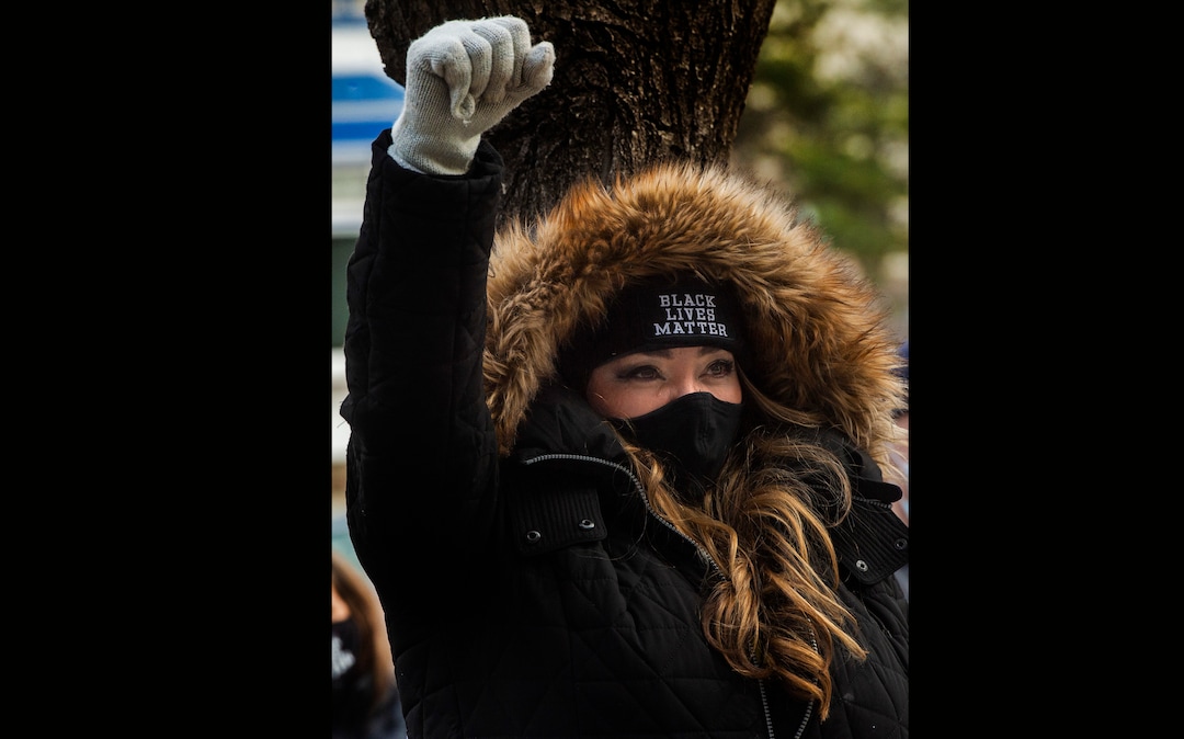 (Rick Egan | The Salt Lake Tribune)  Ma Black chants with Black Lives Matter and other groups, to protest the way the health department has been forcing people experiencing homelessness to move in the middle of a pandemic and the coldest time of the year, in front of the Salt Lake Public Health Center on Friday, Dec. 18, 2020.