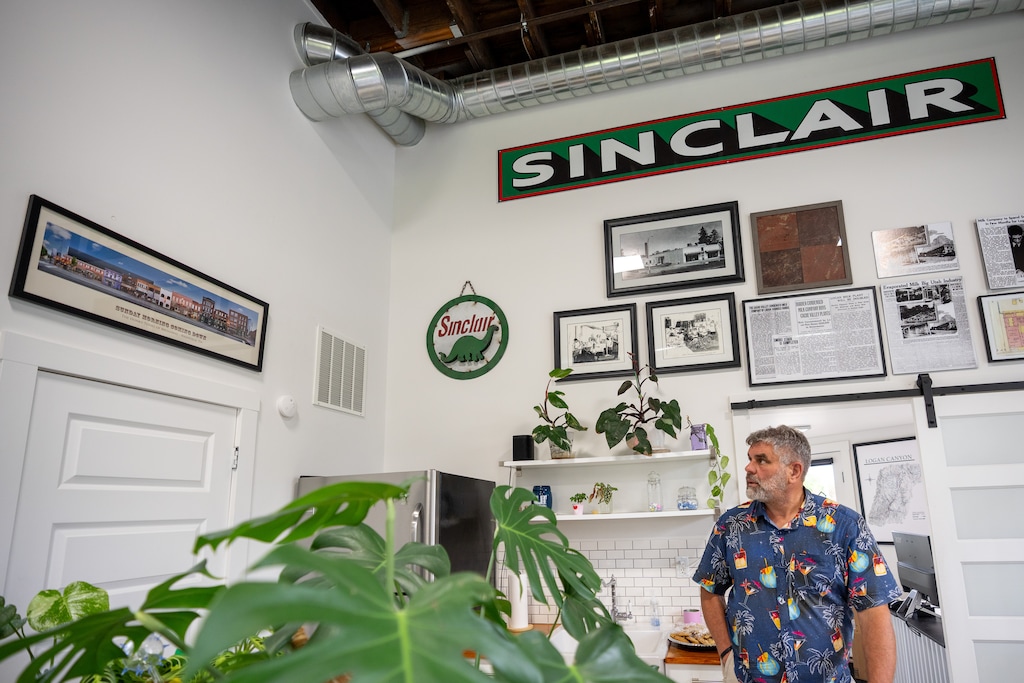 (Trent Nelson  |  The Salt Lake Tribune) Tony Johnson, who has restored several historic buildings throughout Cache Valley, stands in his office, a renovated Sinclair gas station in River Heights, on May 5.