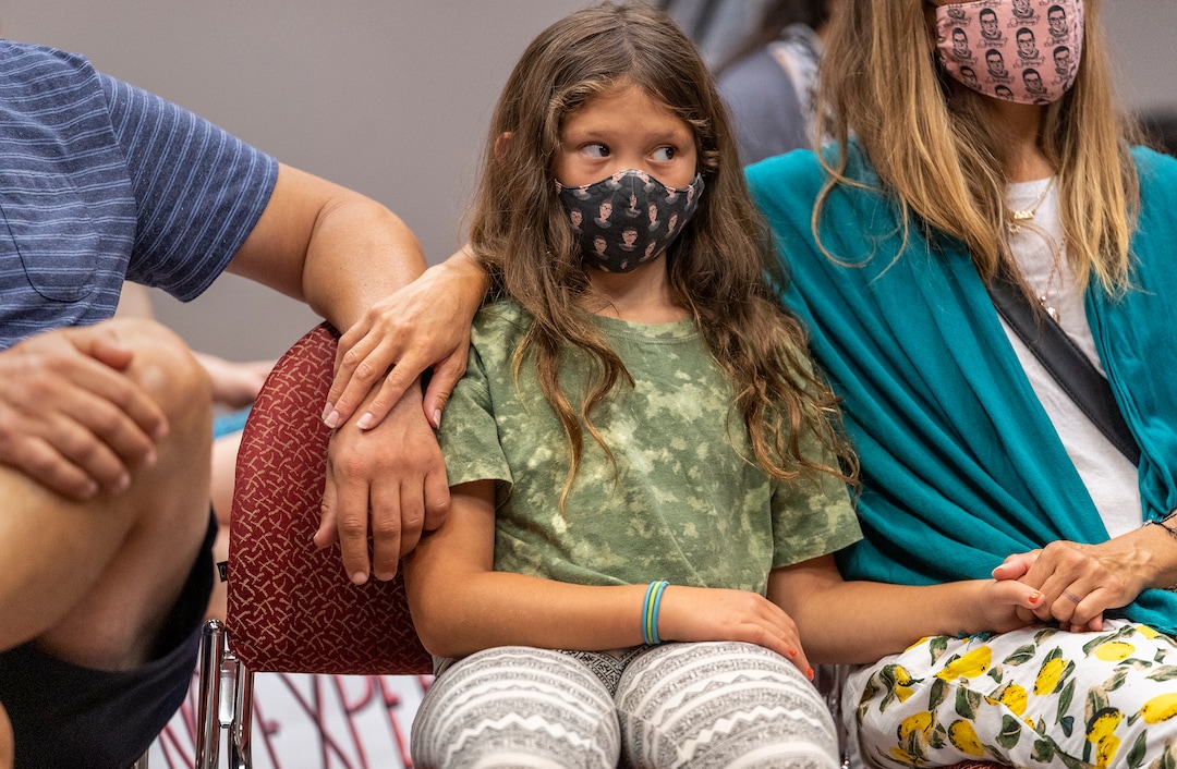 (Leah Hogsten | The Salt Lake Tribune) "What if our message doesn't get through," asked Zemirah Grossman of attorney Greg Skordas at Monday's press conference, who told her the group would need a "better lawyer." Grossman, 9, sits between her father Nate and mother Maurena Grossman. A group of Utah parents is suing the state for its ban on school districts enacting their own mask mandates which they say leaves their kids unnecessarily unprotected and at-risk from COVID-19 in the classroom, Aug. 23, 2021.