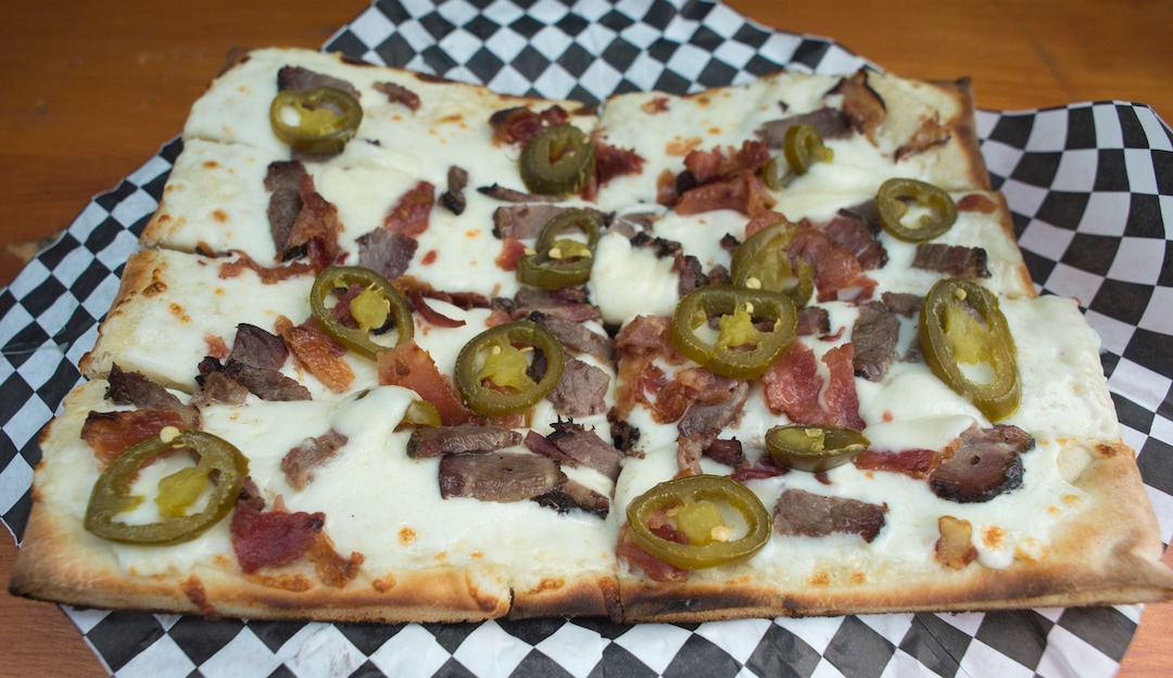 (Rick Egan  |  The Salt Lake Tribune) The Pancho Villa square pizza at Umani is made with white sauce, mozzarella, beef brisket, bacon and, jalapenos.