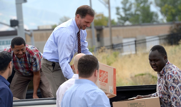 (Al Hartmann | The Salt Lake Tribune)
Rep. Chris Stewart unloads school supplies from his truck donated by citizens from his district for refugee students at Salt Lake Community College's Medowbrook campus in South Salt Lake Tuesday August 22. He later hosted a roundtable discussion with local refugees.