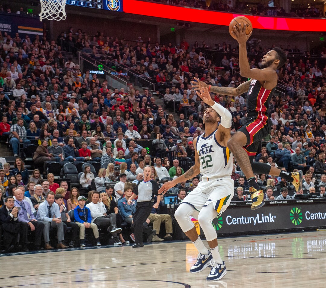 (Rick Egan  |  The Salt Lake Tribune)     Miami Heat forward Derrick Jones Jr. (5) goes in for two points as Utah Jazz forward Thabo Sefolosha (22) defends, in NBA action between Utah Jazz and Miami Heat, at Vivint Smart Home Arena Wednesday, Dec. 12, 2018.