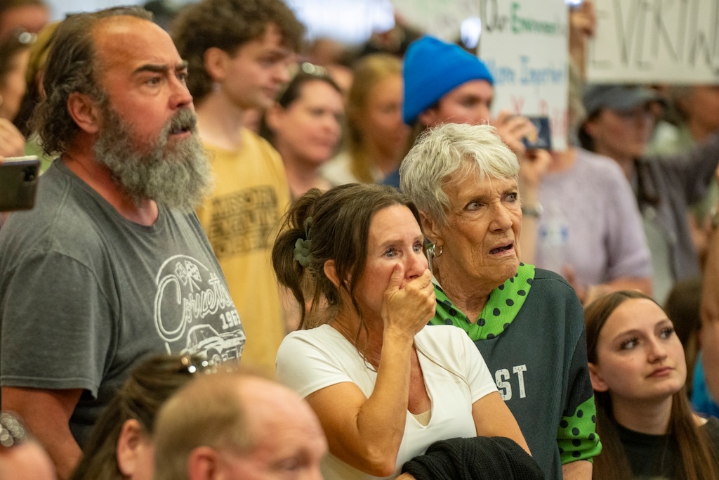 (Rick Egan | The Salt Lake Tribune) Members of the crowd react as commissioners vote to approve a data center campus during a Box Elder County Commission meeting at the county fairgrounds in Tremonton on Tuesday, May 4, 2026.