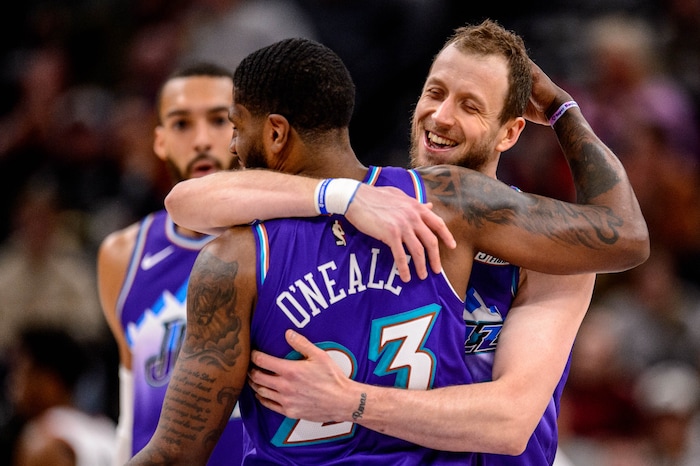 (Trent Nelson  |  The Salt Lake Tribune) Utah Jazz forward Joe Ingles (2) and Utah Jazz forward Royce O'Neale (23) embrace after an Ingles three-pointer as the Utah Jazz host the Portland Trail Blazers, NBA basketball in Salt Lake City on Thursday, Dec. 26, 2019.