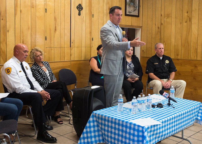 (Rick Egan  |  The Salt Lake Tribune)  Speaker Greg Hughes talks about the homeless problem with westside residents who say that the crackdown on crime in the Rio Grande area has pushed homeless people and drug activity toward their neighborhoods. Friday, August 25, 2017.


