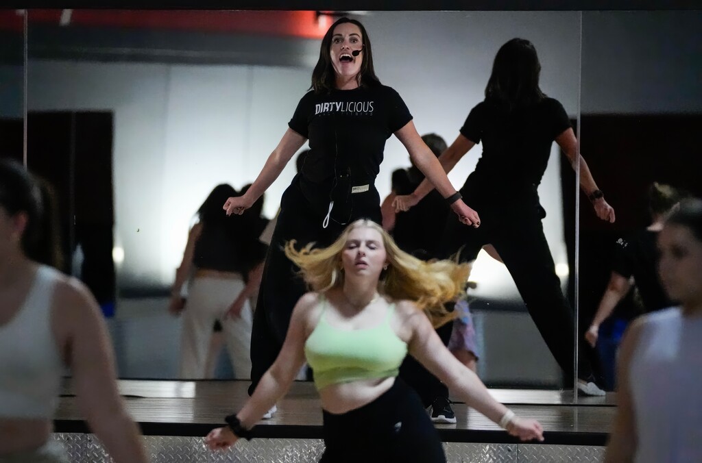 (Francisco Kjolseth | The Salt Lake Tribune) Erica Tanner, founder of Dirtylicious Dance Fitness, teaches a class in Orem on Tuesday, Oct. 14, 2025.
