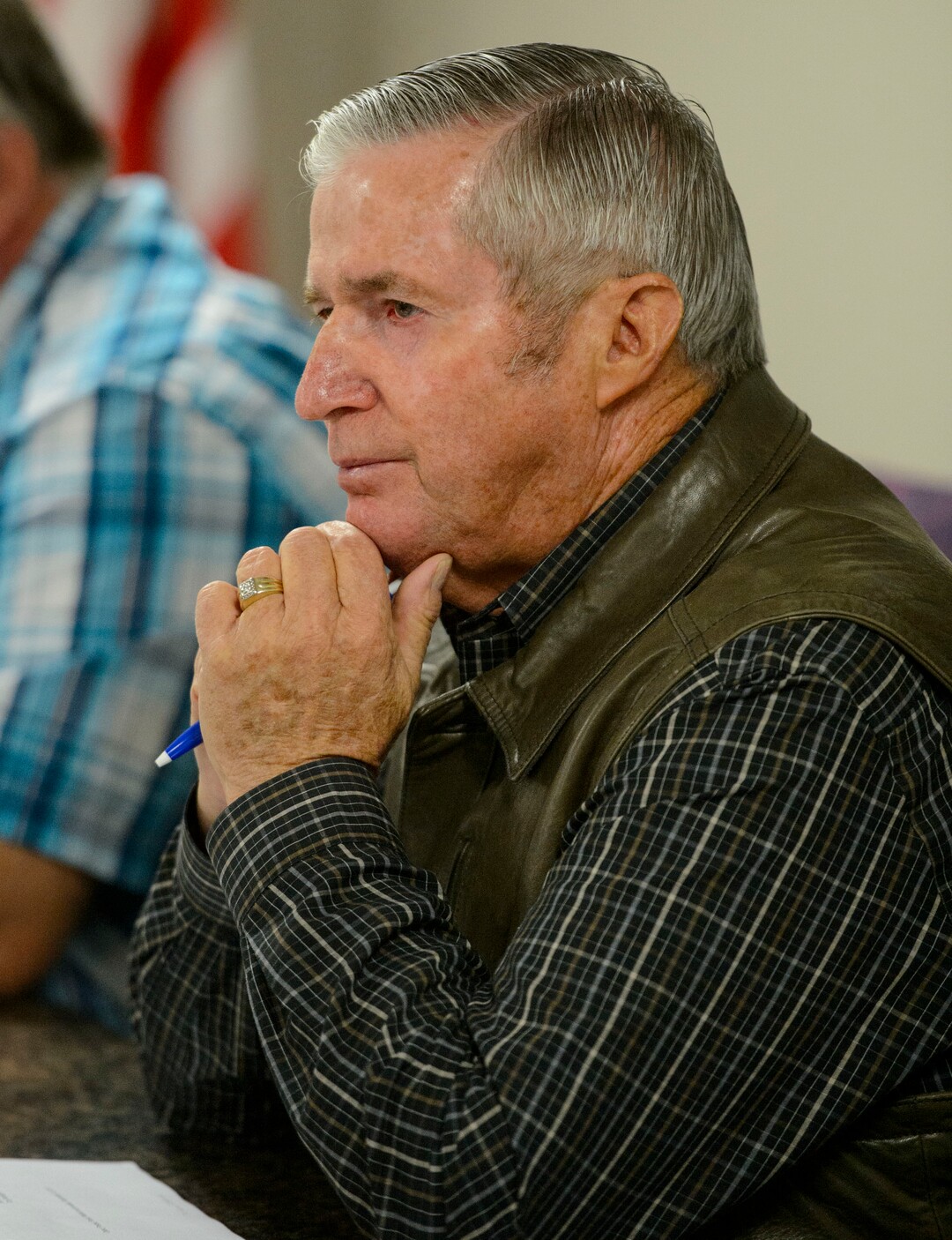 (Steve Griffin  |  The Salt Lake Tribune) Wellsville  Mayor Thomas Bailey listens to Northwest Band Tribal Council Chairman, Darren Parry, as Parry addresses the Wellsville City Council about his concerns with the Sham Battle Wednesday night at the Wellsville City Hall in Wellsville, Utah Wednesday September 20, 2017. The mayor and the city council created a committee to decide the future of the Sham Battle where white residents paint their bodies red, put on war paint, and whoop and fire guns, attacking the humble settlers before being driven off by the cavalry troops. 