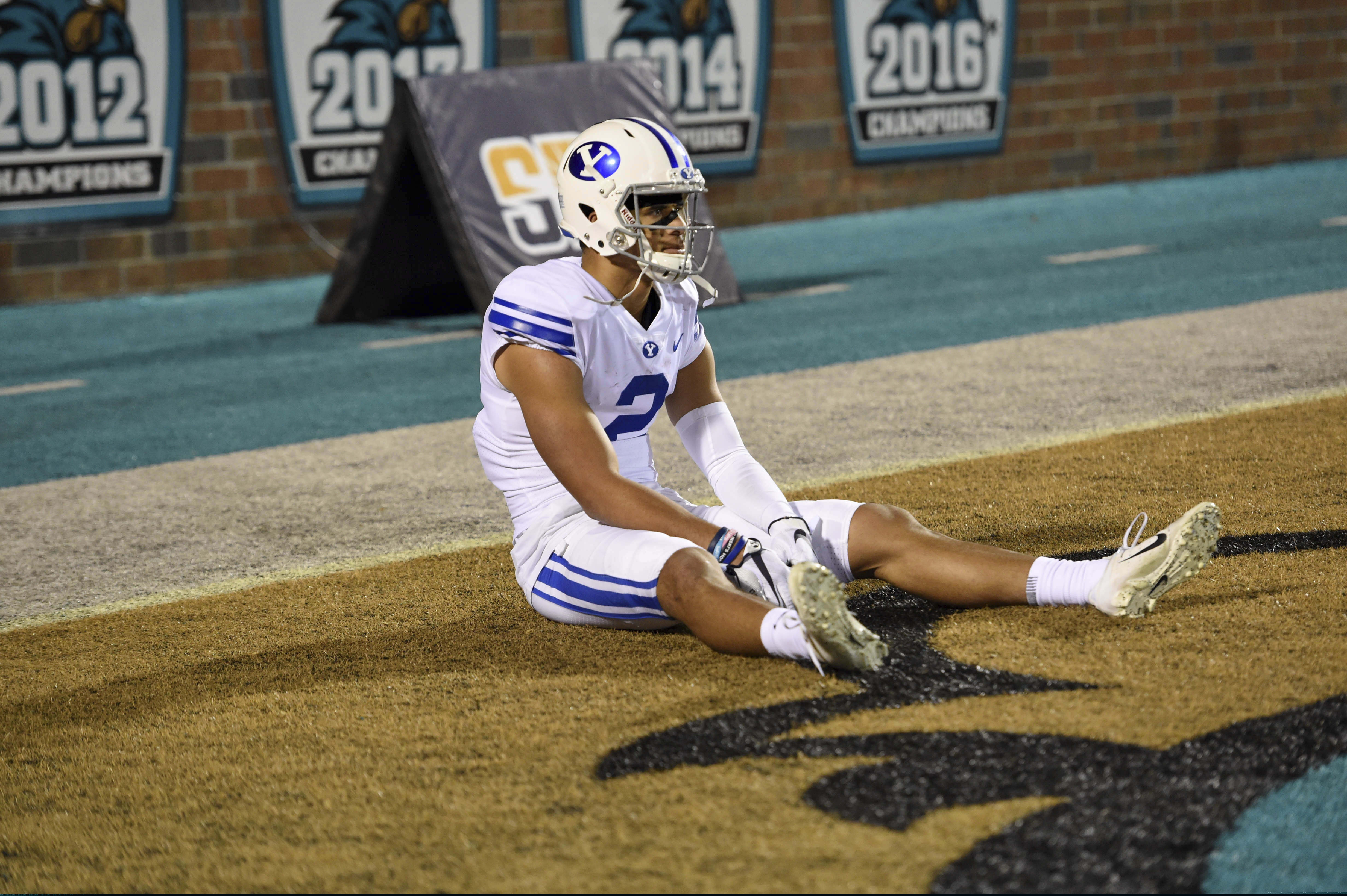 (Richard Shiro | The Associated Press) BYU's Neil Pau'u sits in the end zone after the team's NCAA college football game against Coastal Carolina on Saturday, Dec. 5, 2020, in Conway, S.C. Coastal Carolina won 22-17.
