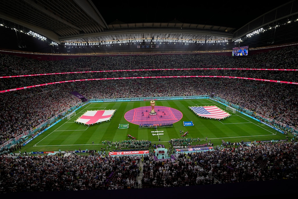 (Ebrahim Noroozi | AP) Players stand for their national anthems ahead of the World Cup group B soccer match between England and The United States, at the Al Bayt Stadium in Al Khor, Qatar, Friday, Nov. 25, 2022.