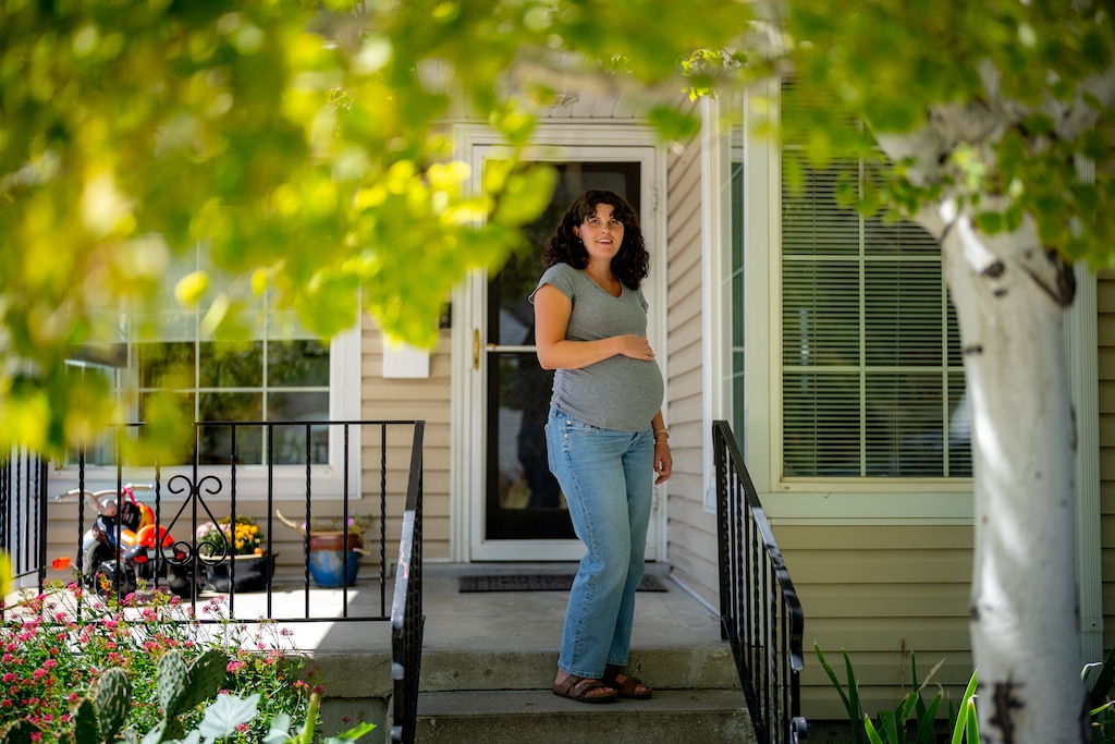 (Trent Nelson  |  The Salt Lake Tribune) Kelsey Brown in Millcreek on Friday, Sept. 11, 2026. She and her husband aren't sure when they’ll be able to afford to move on from the home they bought five years ago — and are now outgrowing.