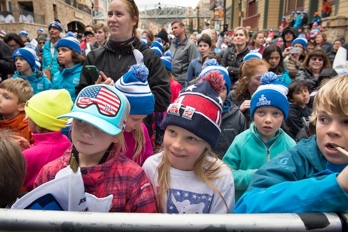 Scott Sommerdorf | The Salt Lake Tribune
Young Olympic fans look up their idols at the end of Park City's Olympic and Paralympic parade down Main Street, Friday, April 6, 2018. The parade celebrates the accomplishments of Park City-based Olympians. Local athletes wrapped up the PyeongChang Winter Games by earning one silver and two bronze medals.